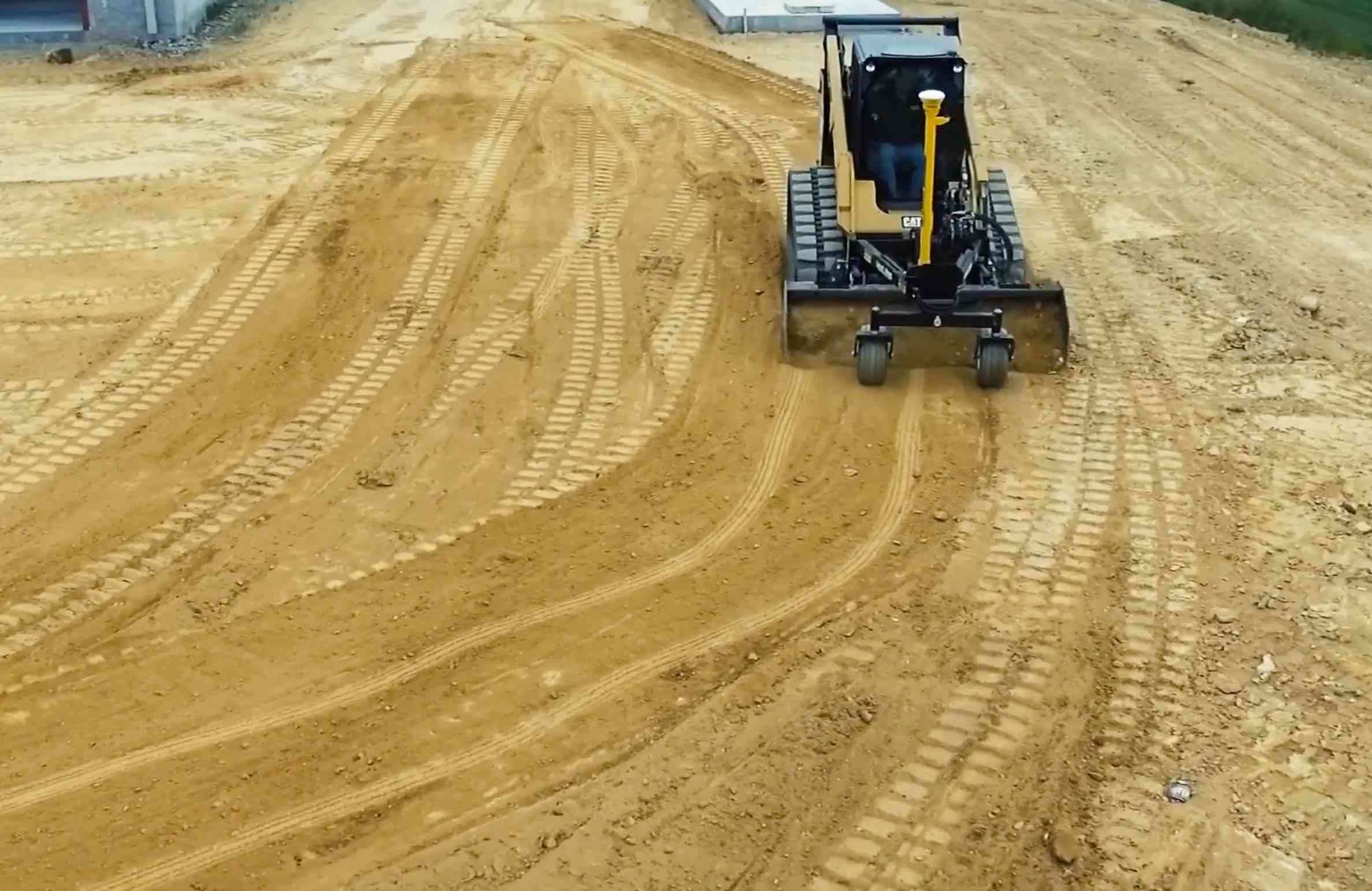 laser grading with compact track loader